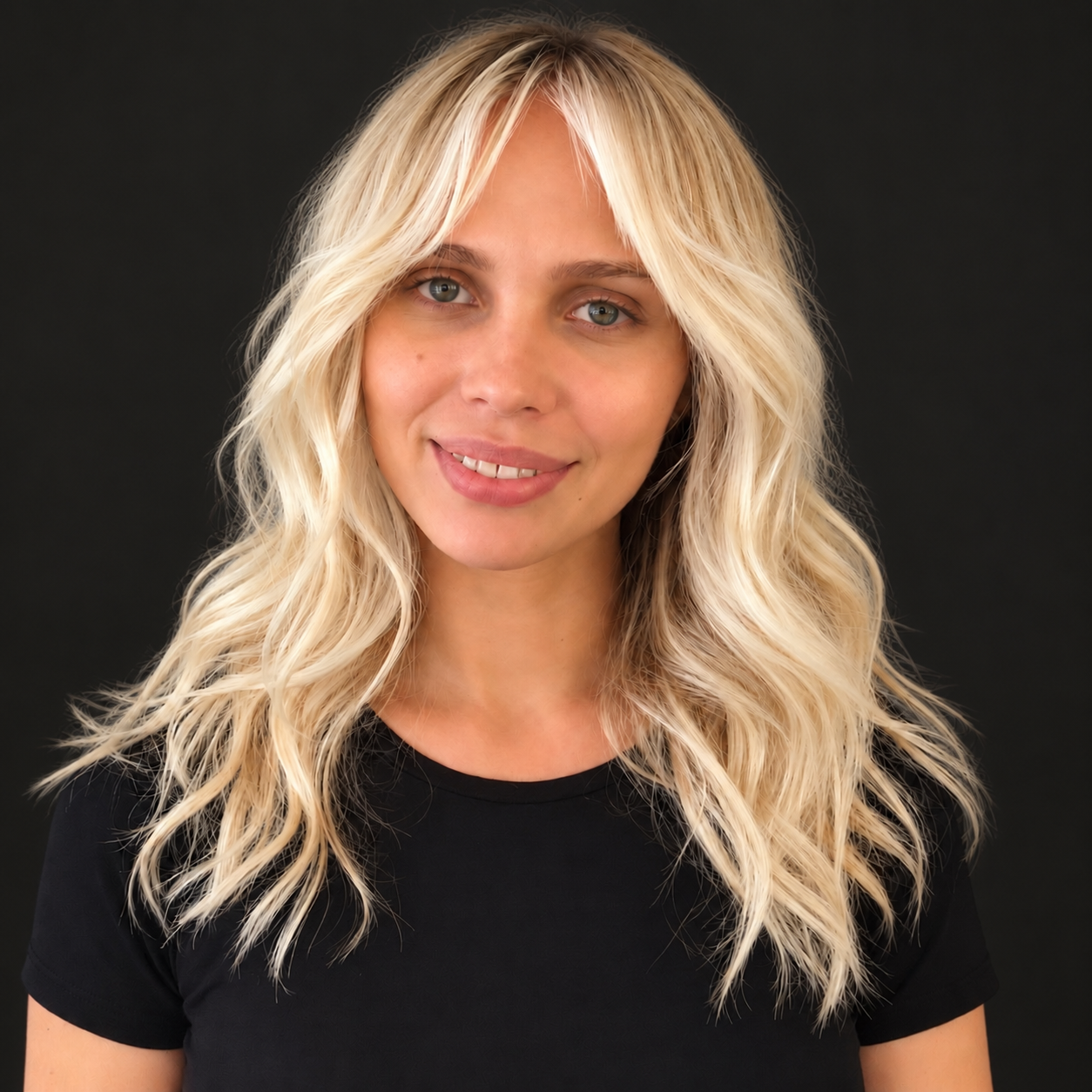 Bright dimensional blonde hair color by Bradley Sanders