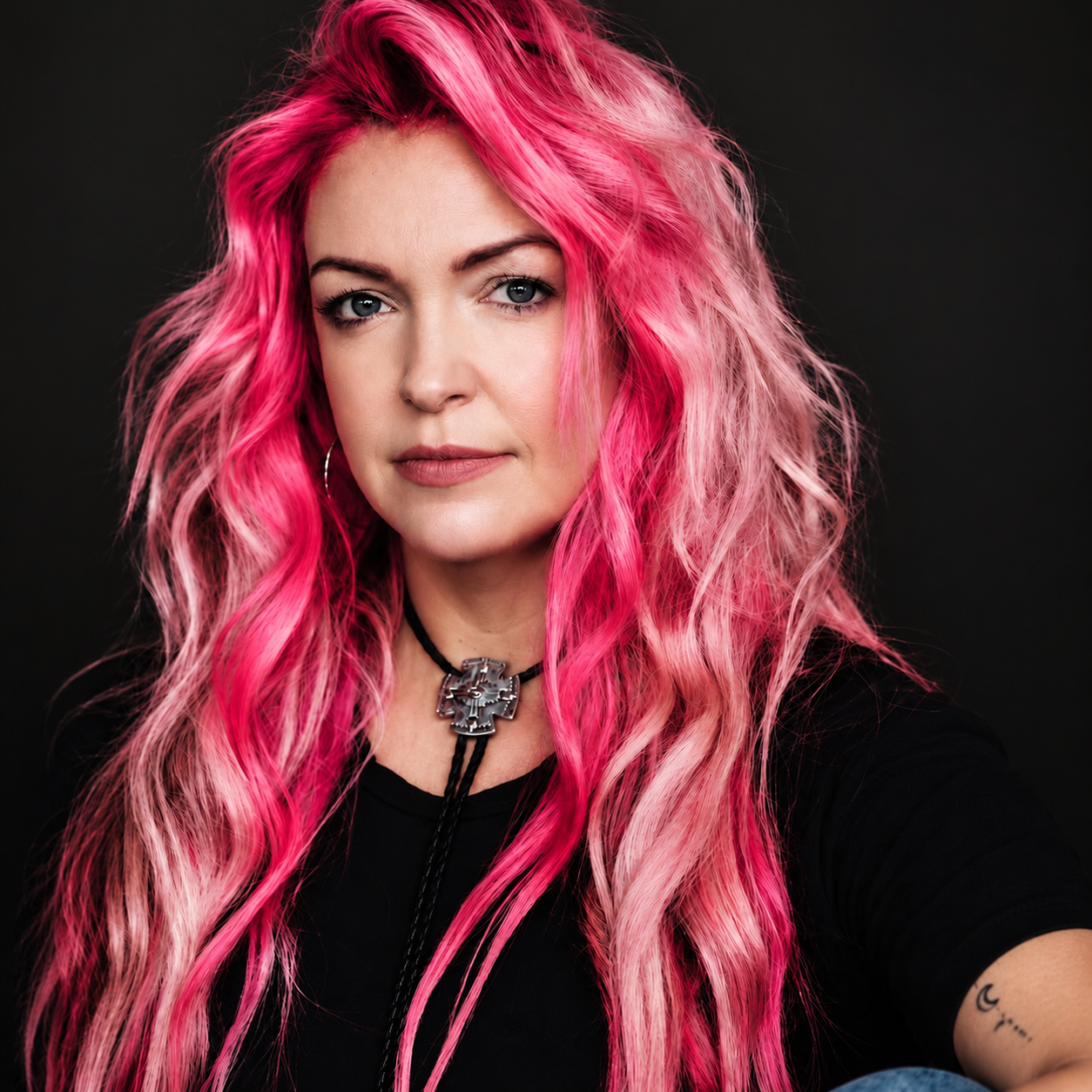 Creative pink hair color by Bradley Sanders