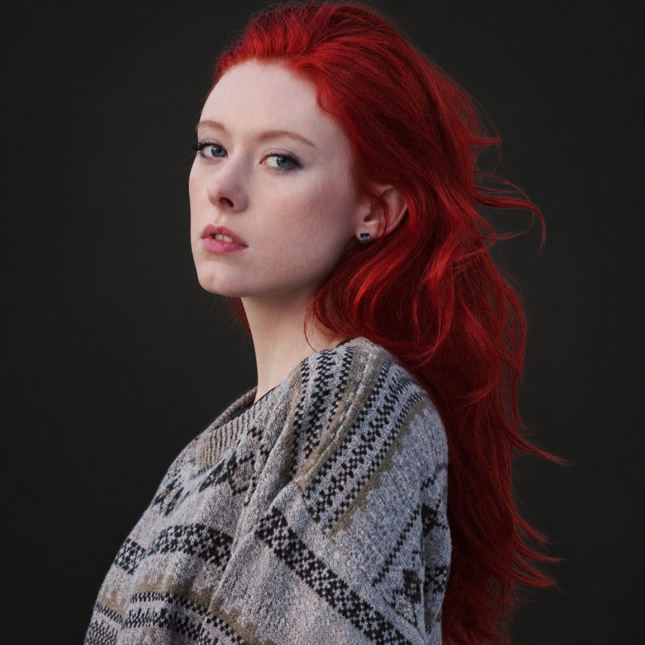 Red editorial hair color by Bradley Sanders