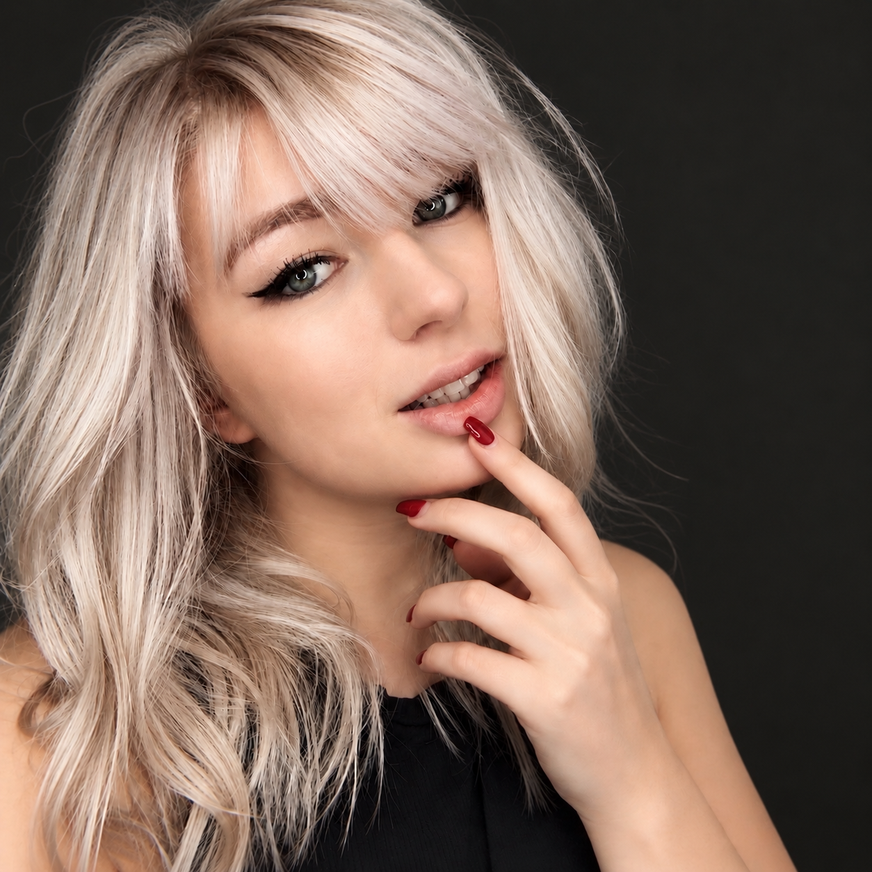 Icy blonde hair color by Bradley Sanders