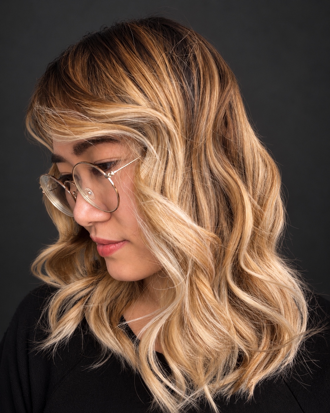 Dimensional bronde with face-framing brightness by Bradley Sanders